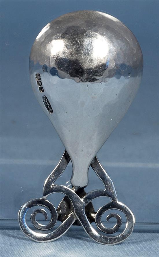 An Edwardian Arts & Crafts silver and enamel caddy spoon, Length 3 ¼”/86mm Width 1 ½”/40mm Weight: 1.2oz/33grms